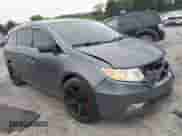 2011 Honda Odyssey LX with VIN 5FNRL5H21BB065204, listed as a IAAI auction lot 42999702 with 202,910 mi miles and . Bid and sale history available at DreamBid. Image 1.