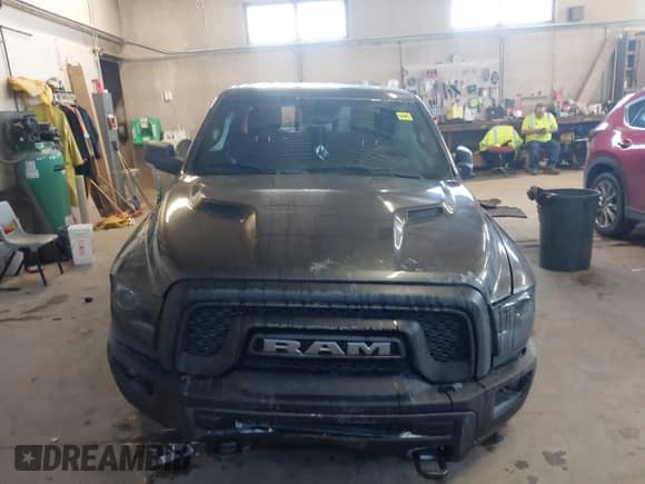 2018 Ram 1500 Rebel with VIN 1C6RR7YT1JS234777, listed as a IAAI auction lot 41409525 with 119,497 mi miles and . Bid and sale history available at DreamBid. Image 12.