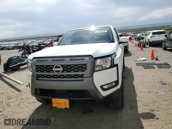 2025 Nissan Frontier SV with VIN 1N6ED1CM2SN625758, listed as a Copart auction lot 65469335 with 1,035 mi miles and Salvage title. Bid and sale history available at DreamBid. Image 13.