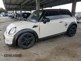 2013 MINI Hardtop with VIN WMWSU3C51DT691076, listed as a Copart auction lot 48066455 with 143,002 mi miles and Salvage title. Bid and sale history available at DreamBid. Image 1.