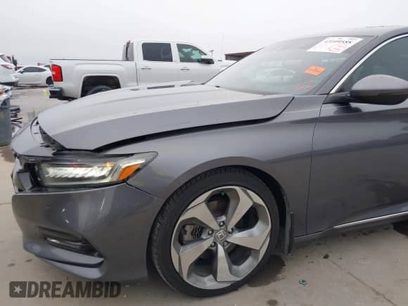 2018 Honda Accord Touring z VIN 1HGCV1F95JA100229, wystawiony jako IAAI lot #43109588 z przebiegiem 129 307 mil mil oraz . Historia ofert i sprzedaży dostępna na DreamBid. Obrazek 20.