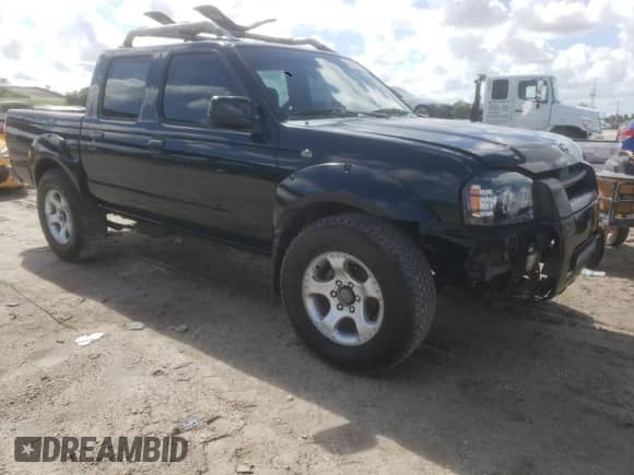 2004 Nissan Frontier XE with VIN 1N6ED27T04C472125, listed as a Copart auction lot 90270775 with 212,696 mi miles and Clean title. Bid and sale history available at DreamBid. Image 4.
