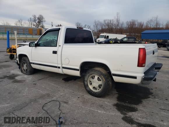 1997 Chevrolet Silverado 1500 with VIN 1GCEC14M2VZ244560, listed as a Copart auction lot 83473674 with 182,944 mi miles and Salvage title. Bid and sale history available at DreamBid. Image 2.