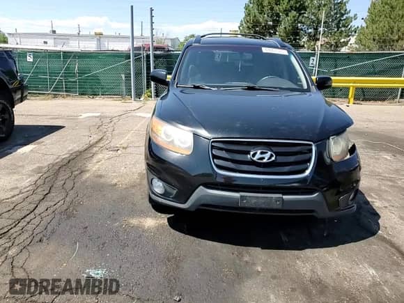 2011 Hyundai Santa Fe Limited z VIN 5XYZKDAG2BG045314, wystawiony jako Copart lot #69867585 z przebiegiem 150 633 mil mil oraz Szkoda całkowita • Salvage title. Historia ofert i sprzedaży dostępna na DreamBid. Obrazek 11.