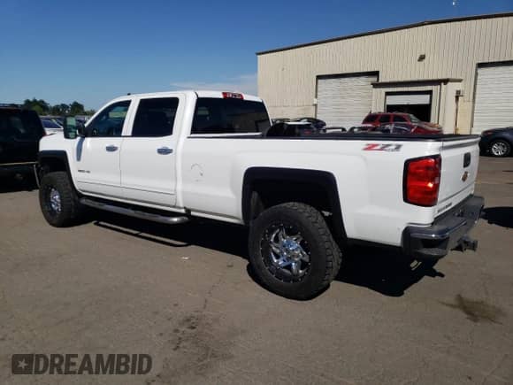 2016 Chevrolet Silverado 2500HD LT with VIN 1GC1KVE89GF221906, listed as a Copart auction lot 62914335 with 175,806 mi miles and Salvage title. Bid and sale history available at DreamBid. Image 2.