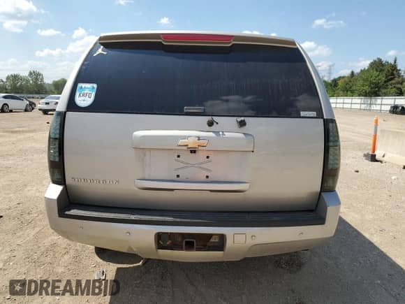 2007 Chevrolet Suburban LTZ z VIN 3GNFK16307G100771, wystawiony jako Copart lot #68825645 z przebiegiem Nie podano mil oraz Szkoda całkowita • Salvage title. Historia ofert i sprzedaży dostępna na DreamBid. Obrazek 6.
