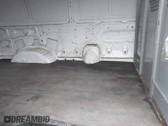 2009 Ford Econoline Cargo Commercial with VIN 1FTNE24W19DA41714, listed as a IAAI auction lot 40910548 with 179,157 mi miles and . Bid and sale history available at DreamBid. Image 8.