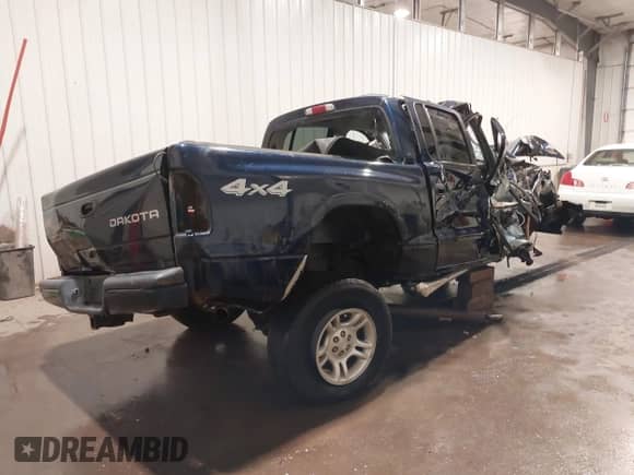 2004 Dodge Dakota Sport with VIN 1D7HG38N44S615599, listed as a IAAI auction lot 41821822 with Not provided miles and . Bid and sale history available at DreamBid. Image 4.