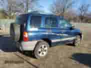 2003 Chevrolet Tracker with VIN 2CNBJ13C836907099, listed as a Copart auction lot 49613725 with Not provided miles and Salvage title. Bid and sale history available at DreamBid. Image 3.