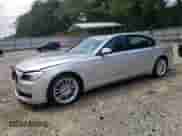 2013 BMW 7 Series 740Li with VIN WBAYE4C5XDD136778, listed as a Copart auction lot 66867895 with 215,858 mi miles and Salvage title. Bid and sale history available at DreamBid. Image 1.