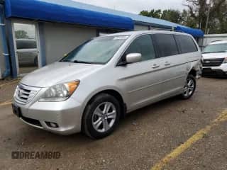 2009 Honda Odyssey Touring with VIN 5FNRL389X9B004784, listed as a Copart auction lot 85919565 with 231,160 mi miles and Salvage title. Bid and sale history available at DreamBid. Image 1.