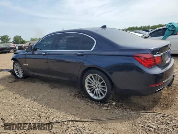 2013 BMW 7 Series 750Li xDrive with VIN WBAYF8C53DD139994, listed as a Copart auction lot 67231905 with 90,583 mi miles and Salvage title. Bid and sale history available at DreamBid. Image 2.