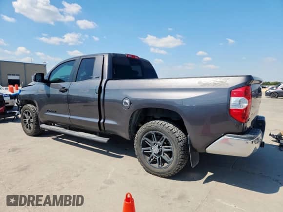 2018 Toyota Tundra SR5 с VIN 5TFRM5F11JX128197, выставлен на аукционе Copart как лот 81984505 с пробегом 168 233 миль миль и Списание • Salvage title. История ставок и продаж доступна на DreamBid. Изображение 2.