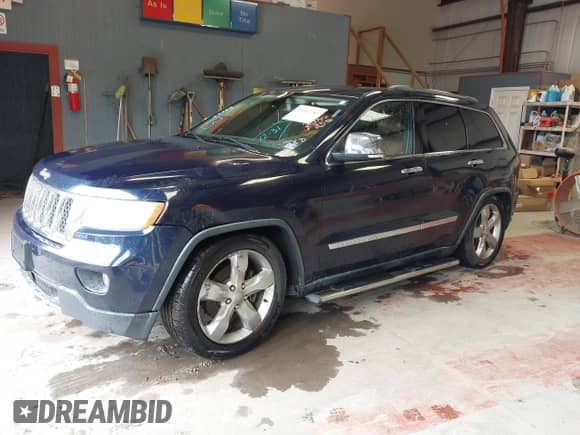 2012 Jeep Grand Cherokee Overland z VIN 1C4RJFCG1CC262788, wystawiony jako IAAI lot #43212743 z przebiegiem 211 731 mil mil oraz . Historia ofert i sprzedaży dostępna na DreamBid. Obrazek 20.