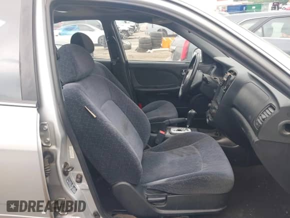 2003 Hyundai Sonata with VIN KMHWF25H23A858454, listed as a IAAI auction lot 42016877 with 135,539 mi miles and . Bid and sale history available at DreamBid. Image 5.