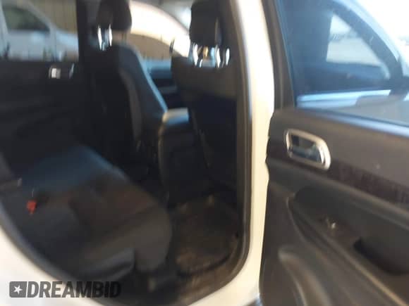 2012 Jeep Grand Cherokee Laredo with VIN 1C4RJFAG8CC141355, listed as a IAAI auction lot 43390830 with 173,259 mi miles and . Bid and sale history available at DreamBid. Image 8.