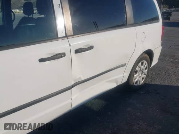 2015 Dodge Grand Caravan American Value с VIN 2C4RDGBG1FR518891, выставлен на аукционе IAAI как лот 43540362 с пробегом 131 754 миль миль и . История ставок и продаж доступна на DreamBid. Изображение 6.