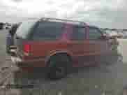 1999 Chevrolet Blazer LS z VIN 1GNCS13W2X2156012, wystawiony jako Copart lot #79730344 z przebiegiem 142 788 mil mil oraz Szkoda całkowita • Salvage title. Historia ofert i sprzedaży dostępna na DreamBid. Obrazek 3.