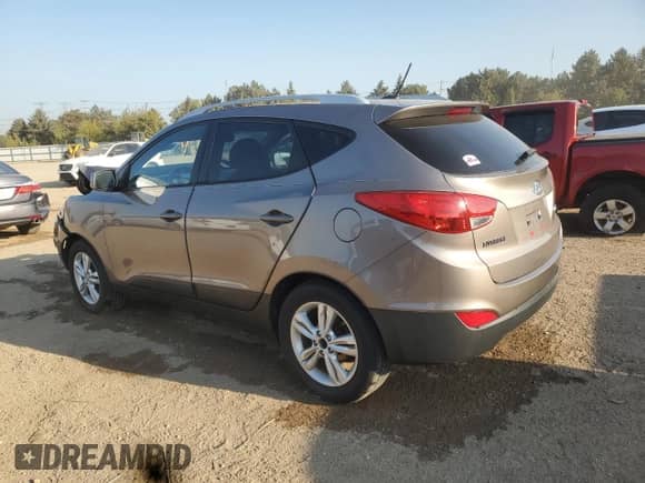 2011 Hyundai Tucson GLS z VIN KM8JU3AC3BU292656, wystawiony jako Copart lot #84770755 z przebiegiem 157 911 mil mil oraz Szkoda całkowita • Salvage title. Historia ofert i sprzedaży dostępna na DreamBid. Obrazek 2.