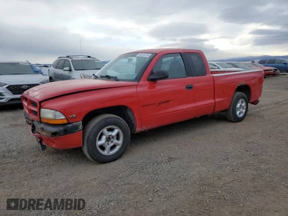 1998 Dodge Dakota SLT z VIN 1B7GL22X4WS573038, wystawiony jako Copart lot #44205935 z przebiegiem 126 293 mil mil oraz Czysty tytuł • Clean title. Historia ofert i sprzedaży dostępna na DreamBid. Obrazek 1.