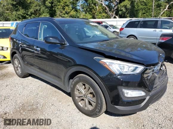 2016 Hyundai Santa Fe with VIN 5XYZU3LB3GG378442, listed as a Copart auction lot 82461355 with 63,670 mi miles and Salvage title. Bid and sale history available at DreamBid. Image 4.