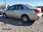 2004 Toyota Corolla CE z VIN 1NXBR32E94Z301126, wystawiony jako Copart lot #87467835 z przebiegiem 181 189 mil mil oraz Szkoda całkowita • Salvage title. Historia ofert i sprzedaży dostępna na DreamBid. Obrazek 2.