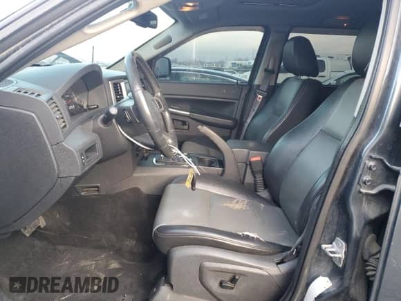 2008 Jeep Grand Cherokee Laredo z VIN 1J8HR48M98C185305, wystawiony jako Copart lot #83466944 z przebiegiem 166 769 mil mil oraz Czysty tytuł • Clean title. Historia ofert i sprzedaży dostępna na DreamBid. Obrazek 7.