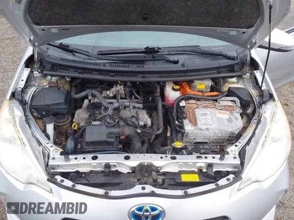 2013 Toyota Prius One z VIN JTDKDTB3XD1051060, wystawiony jako IAAI lot #42851670 z przebiegiem 163 017 mil mil oraz . Historia ofert i sprzedaży dostępna na DreamBid. Obrazek 10.