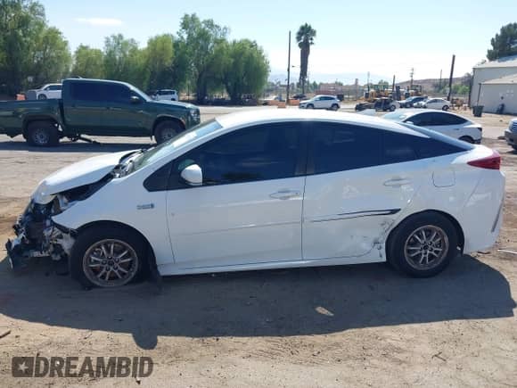 2022 Toyota Prius Limited with VIN JTDKAMFP7N3201286, listed as a IAAI auction lot 43282629 with 31,664 mi miles and . Bid and sale history available at DreamBid. Image 14.