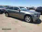 2008 Dodge Magnum SXT with VIN 2D4FV37V78H129071, listed as a Copart auction lot 64698115 with 127,442 mi miles and Salvage title. Bid and sale history available at DreamBid. Image 4.