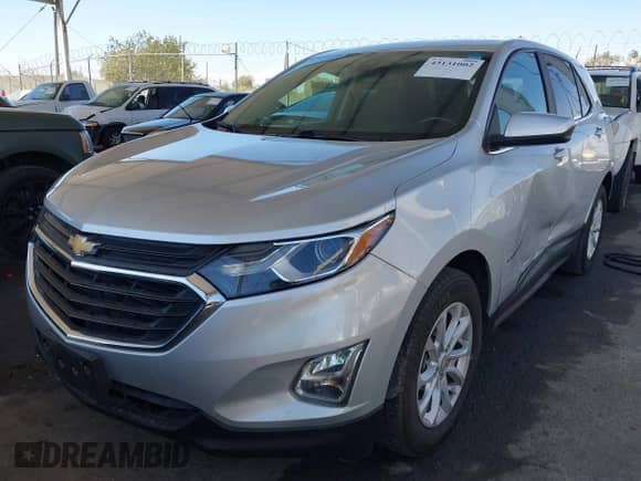 2021 Chevrolet Equinox LT with VIN 3GNAXJEV6MS161985, listed as a IAAI auction lot 43131002 with 169,303 mi miles and . Bid and sale history available at DreamBid. Image 2.
