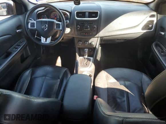 2014 Dodge Avenger SXT z VIN 1C3CDZCG1EN217263, wystawiony jako Copart lot #87255475 z przebiegiem 144 925 mil mil oraz Czysty tytuł • Clean title. Historia ofert i sprzedaży dostępna na DreamBid. Obrazek 8.