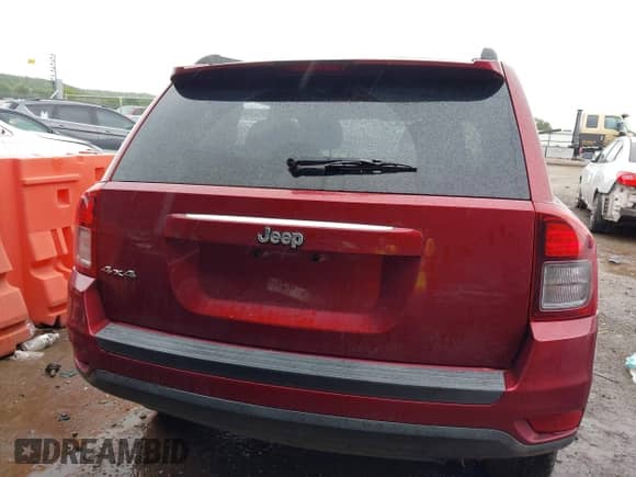 2014 Jeep Compass Sport z VIN 1C4NJDBBXED665156, wystawiony jako IAAI lot #43095675 z przebiegiem 122 639 mil mil oraz . Historia ofert i sprzedaży dostępna na DreamBid. Obrazek 15.
