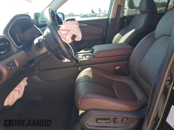 2023 Honda Pilot Elite с VIN 5FNYG1H88PB025254, выставлен на аукционе Copart как лот 84804475 с пробегом 32 604 миль миль и Списание • Salvage title. История ставок и продаж доступна на DreamBid. Изображение 7.