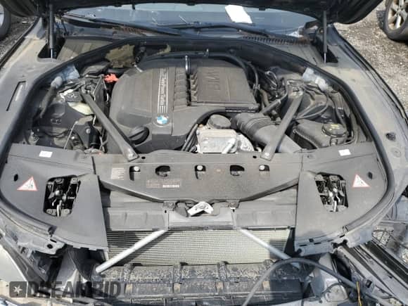 2015 BMW 7 Series 740Li z VIN WBAYE4C53FD947082, wystawiony jako Copart lot #64368025 z przebiegiem Nie podano mil oraz Szkoda całkowita • Salvage title. Historia ofert i sprzedaży dostępna na DreamBid. Obrazek 11.