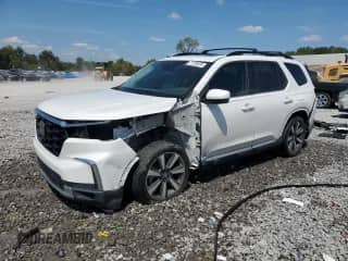 2023 Honda Pilot Elite with VIN 5FNYG1H81PB009610, listed as a Copart auction lot 71729585 with 55,144 mi miles and Salvage title. Bid and sale history available at DreamBid. Image 1.