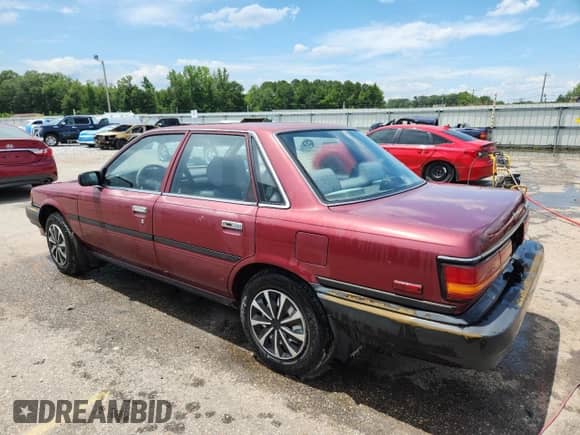 1991 Toyota Camry с VIN 4T1SV24E1MU437771, выставлен на аукционе Copart как лот 62735225 с пробегом 223 465 миль миль и Списание • Salvage title. История ставок и продаж доступна на DreamBid. Изображение 2.