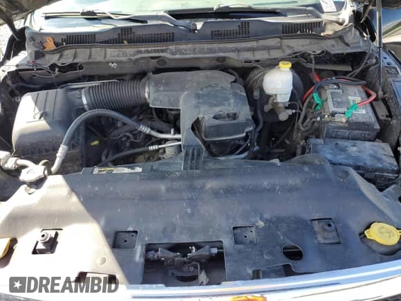 2013 Ram 1500 SLT z VIN 1C6RR6LGXDS562241, wystawiony jako Copart lot #90348585 z przebiegiem 156 452 mil mil oraz Czysty tytuł • Clean title. Historia ofert i sprzedaży dostępna na DreamBid. Obrazek 11.