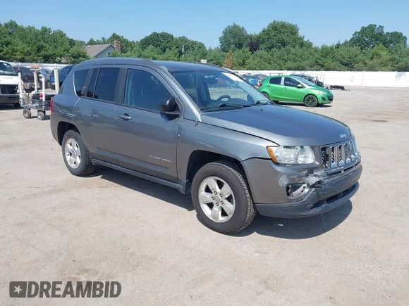 2013 Jeep Compass Sport z VIN 1C4NJCBA3DD265990, wystawiony jako IAAI lot #42644318 z przebiegiem 130 092 mil mil oraz . Historia ofert i sprzedaży dostępna na DreamBid. Obrazek 1.