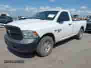 2019 Ram 1500 Tradesman z VIN 3C6JR6DT4KG648920, wystawiony jako IAAI lot #42531432 z przebiegiem 128 735 mil mil oraz . Historia ofert i sprzedaży dostępna na DreamBid. Obrazek 2.