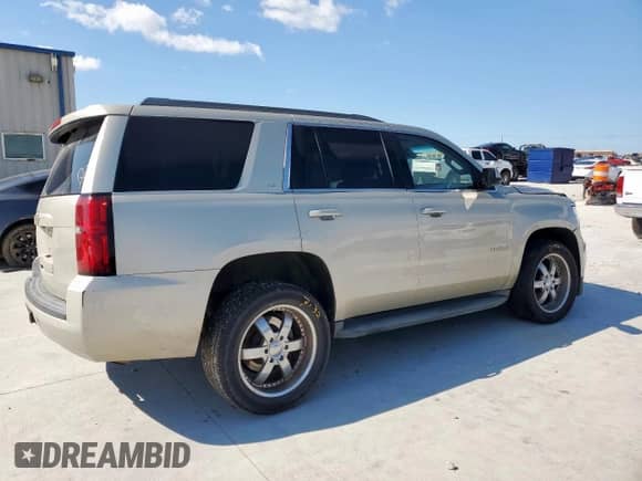 2015 Chevrolet Tahoe LS с VIN 1GNSCAKC4FR256442, выставлен на аукционе Copart как лот 71361245 с пробегом 157 107 миль миль и Списание • Salvage title. История ставок и продаж доступна на DreamBid. Изображение 3.