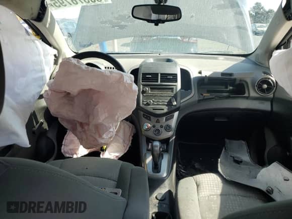 2015 Chevrolet Sonic LS с VIN 1G1JA5SGXF4217204, выставлен на аукционе Copart как лот 80576795 с пробегом 83 059 миль миль и Списание • Salvage title. История ставок и продаж доступна на DreamBid. Изображение 8.