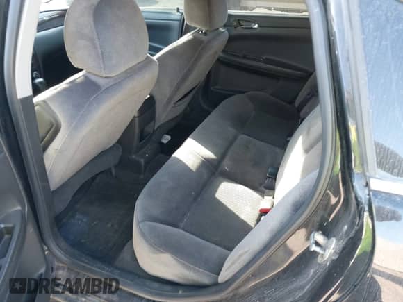 2014 Chevrolet Impala LT z VIN 2G1WB5E30E1103329, wystawiony jako IAAI lot #43463588 z przebiegiem 146 927 mil mil oraz . Historia ofert i sprzedaży dostępna na DreamBid. Obrazek 8.