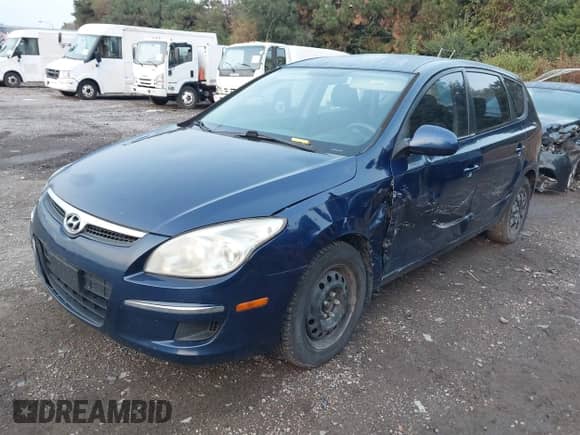 2012 Hyundai Elantra GLS z VIN KMHDB8AEXCU129926, wystawiony jako IAAI lot #43161581 z przebiegiem 185 638 mil mil oraz . Historia ofert i sprzedaży dostępna na DreamBid. Obrazek 2.