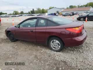 2002 Saturn SC с VIN 1G8ZP12892Z239888, выставлен на аукционе Copart как лот 72613284 с пробегом 130 138 миль миль и Списание • Salvage title. История ставок и продаж доступна на DreamBid. Изображение 2.