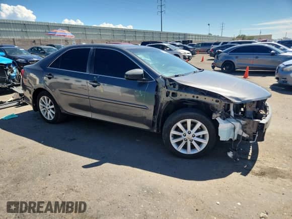2014 Toyota Camry XLE with VIN 4T4BF1FK3ER345708, listed as a Copart auction lot 71482385 with 141,276 mi miles and Salvage title. Bid and sale history available at DreamBid. Image 4.