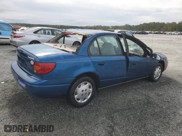 2000 Saturn SL with VIN 1G8ZH5284YZ220128, listed as a Copart auction lot 73846764 with 134,478 mi miles and Non repairable. Bid and sale history available at DreamBid. Image 3.