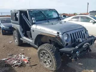 2015 Jeep Wrangler Rubicon with VIN 1C4BJWCG0FL675520, listed as a IAAI auction lot 41672867 with 42,842 mi miles and . Bid and sale history available at DreamBid. Image 1.