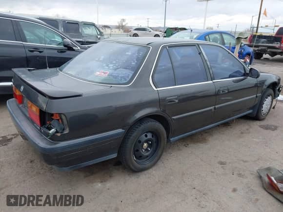 1991 Honda Accord LX z VIN JHMCB7653MC090847, wystawiony jako IAAI lot #41561641 z przebiegiem 163 258 mil mil oraz . Historia ofert i sprzedaży dostępna na DreamBid. Obrazek 4.
