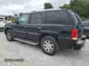 2003 Cadillac Escalade with VIN 1GYEK63N73R207201, listed as a Copart auction lot 60664235 with 237,318 mi miles and Clean title. Bid and sale history available at DreamBid. Image 2.